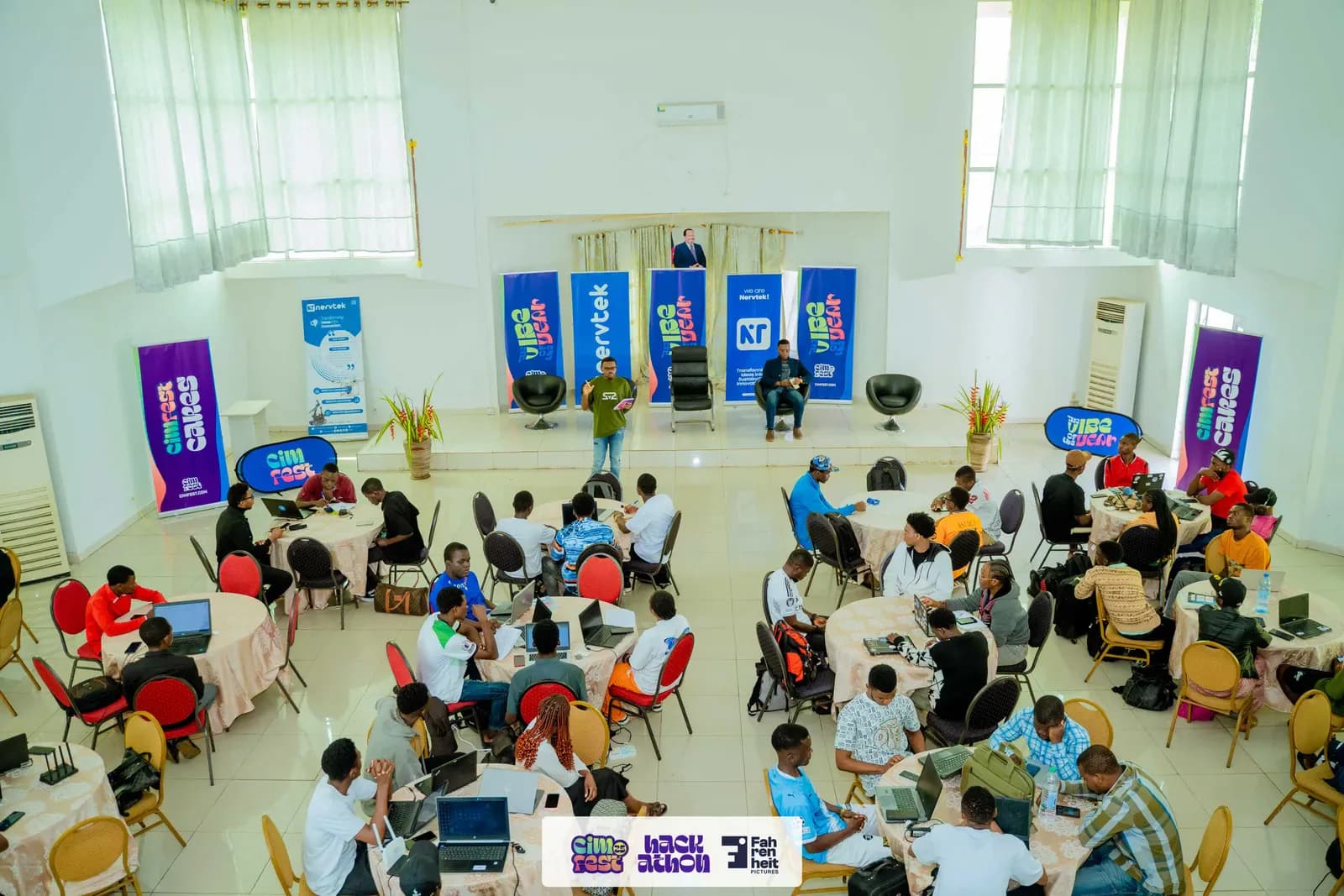 Teams building ideas at the CIMFEST Hackathon